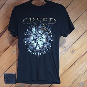 Creed Black and Gold Graphic Tee
